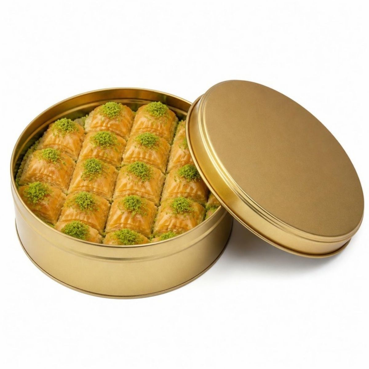 Open tin of golden baklava with pistachios