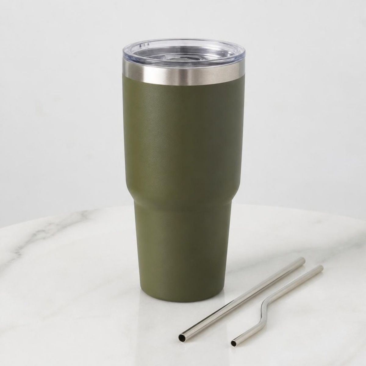 Olive green stainless steel tumbler with a lid and two metal straws