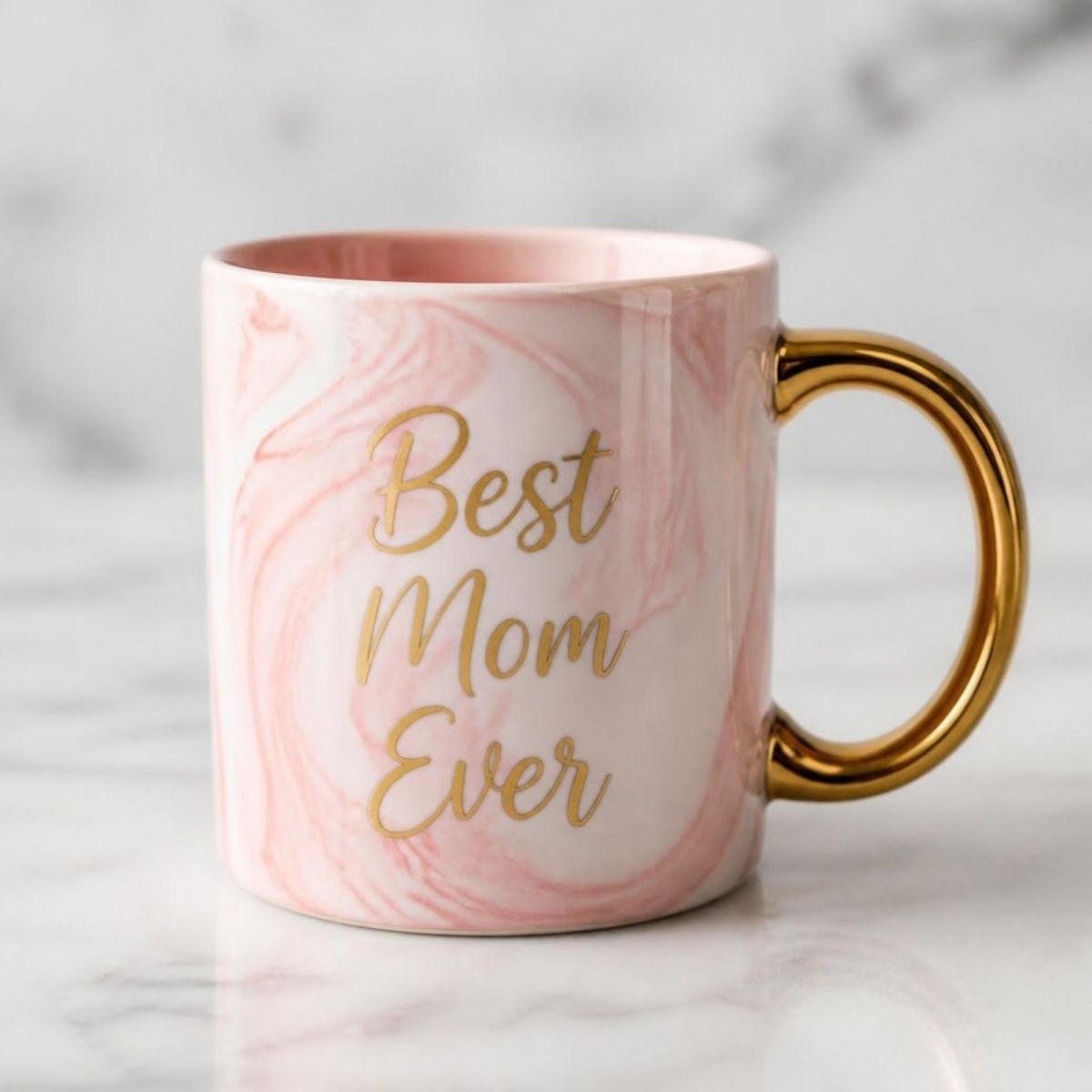 Pink marble mug with gold "Best Mom Ever" lettering and gold handle