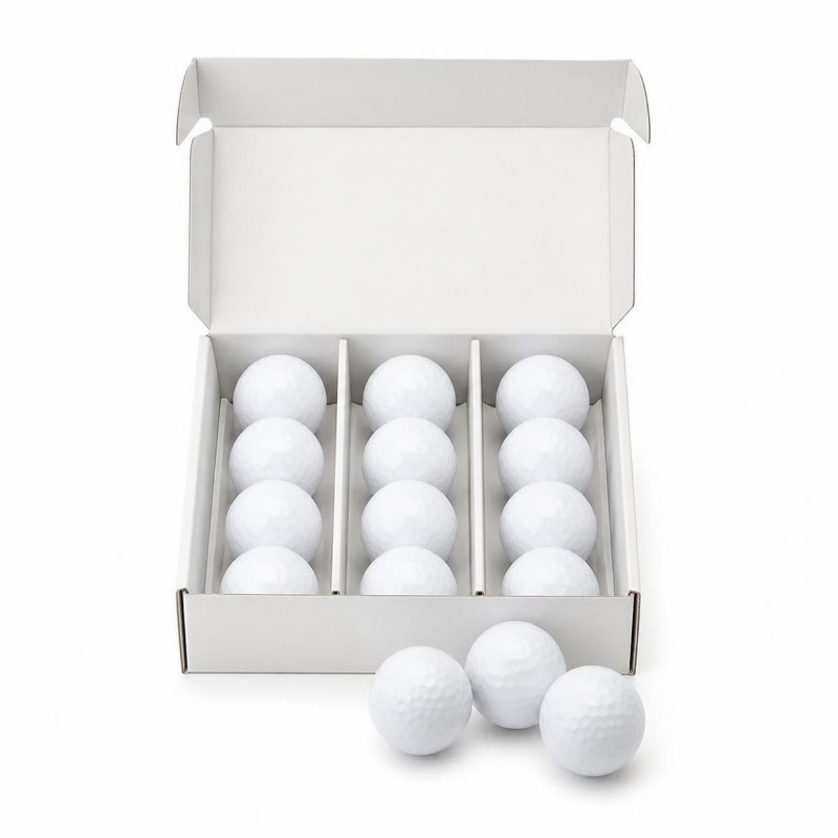 Open white box of a dozen white golf balls