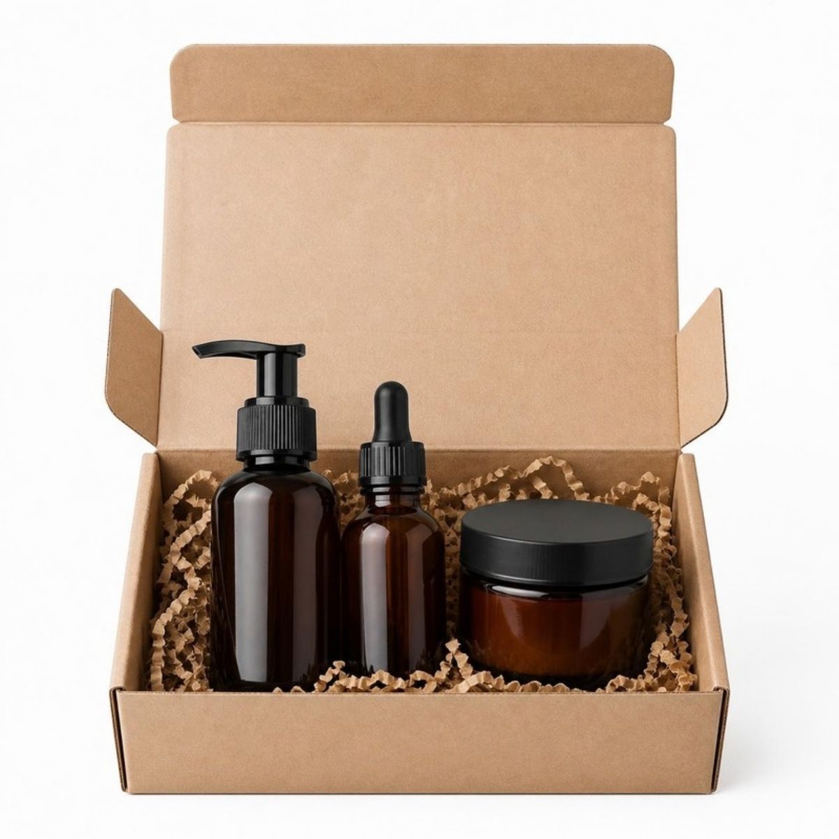 Beard wash, oil and balm in brown bottles and a jar in a kraft box