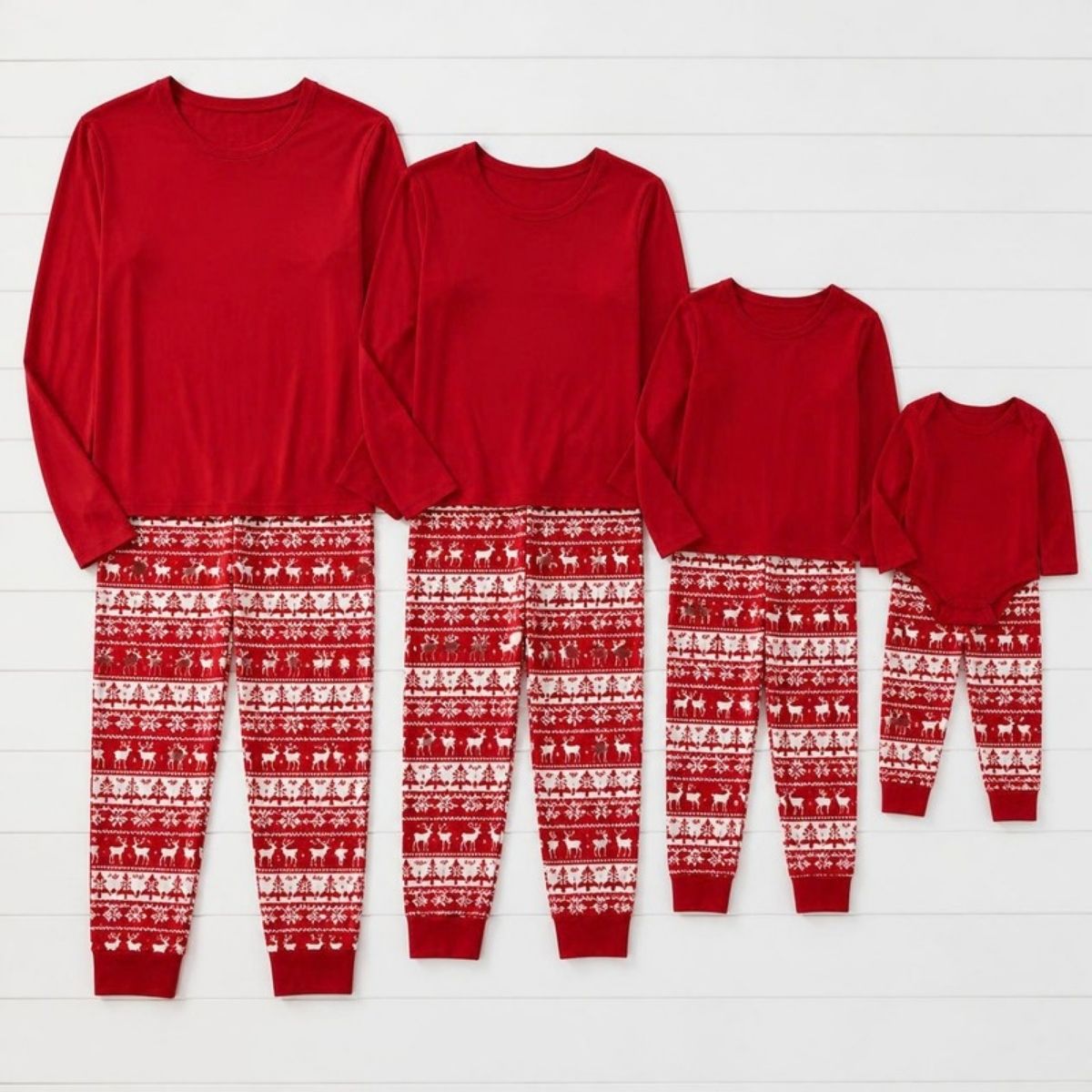 Matching red and white Christmas pajamas in family sizes