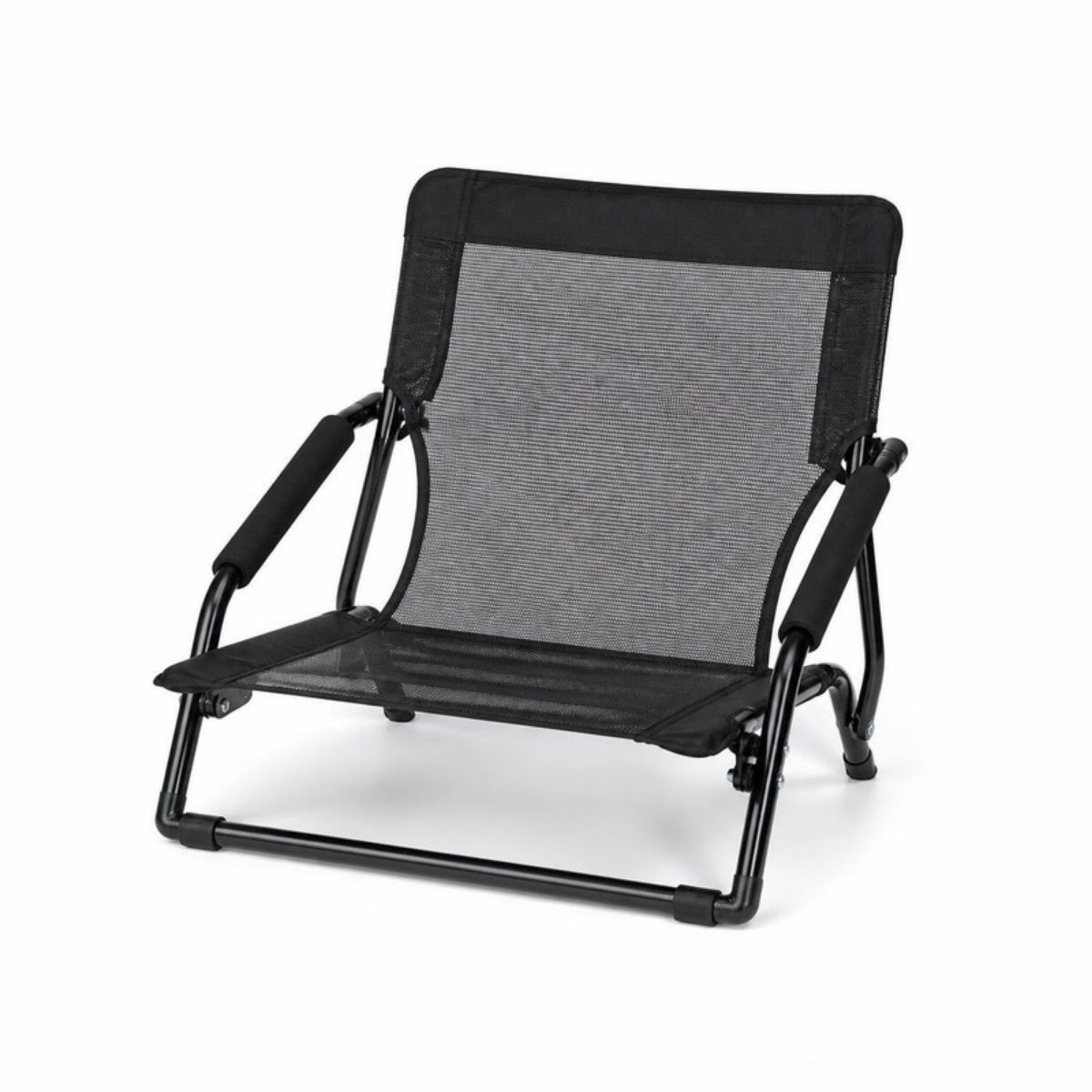 Black low folding mesh beach chair with padded armrests
