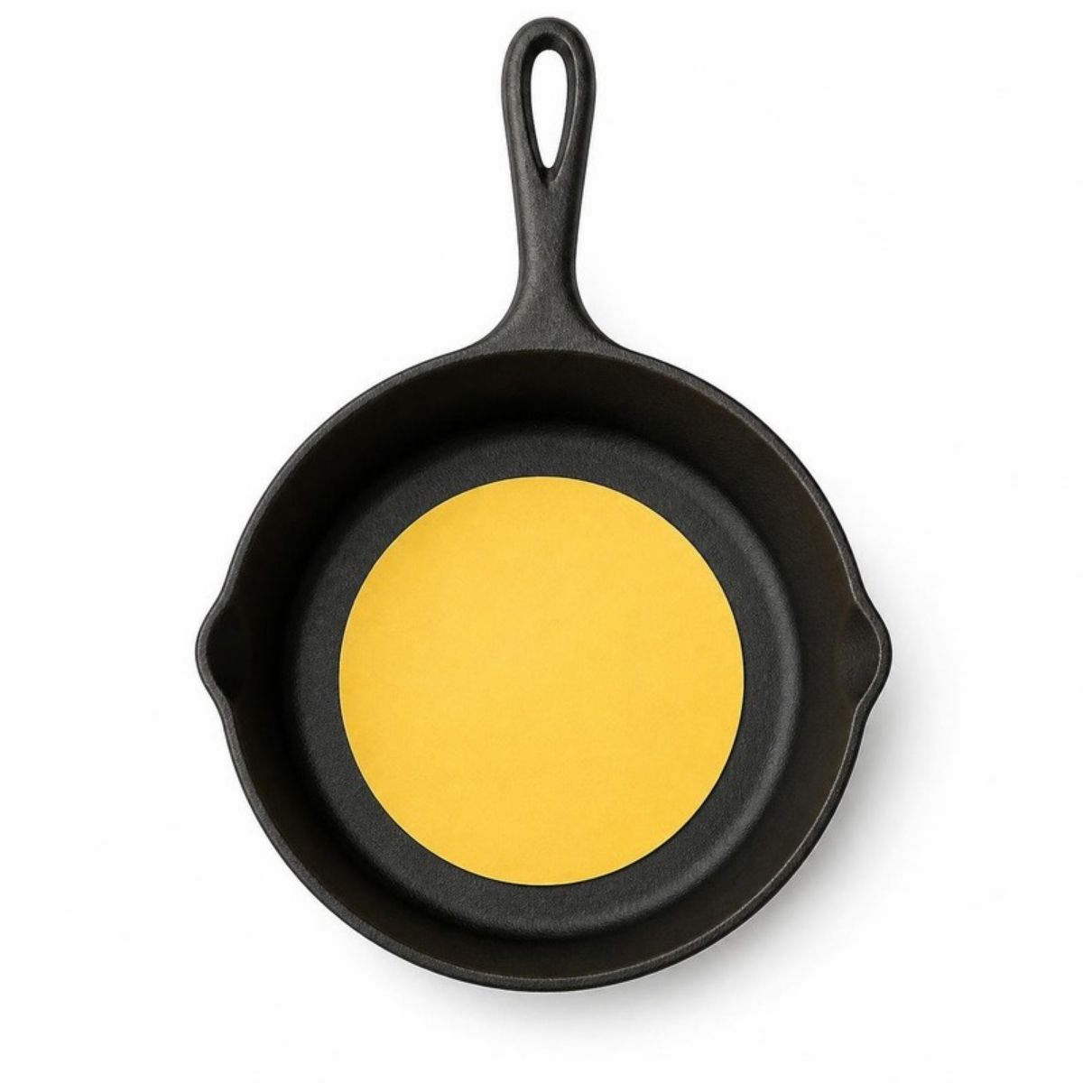 Black cast iron skillet with a plain yellow label in the middle