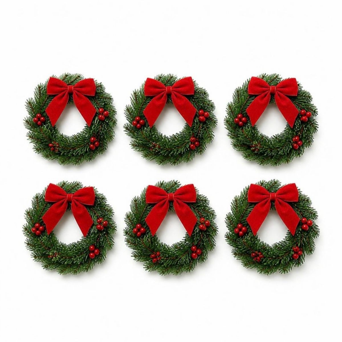 Six small pine wreaths with red bows and berries