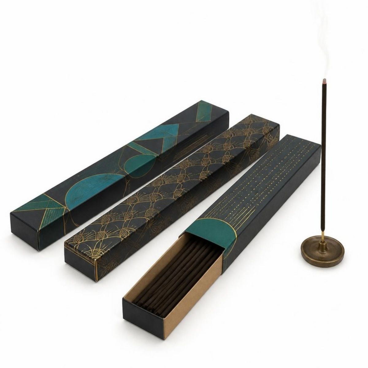 Packs of incense sticks in black, gold and teal patterned boxes