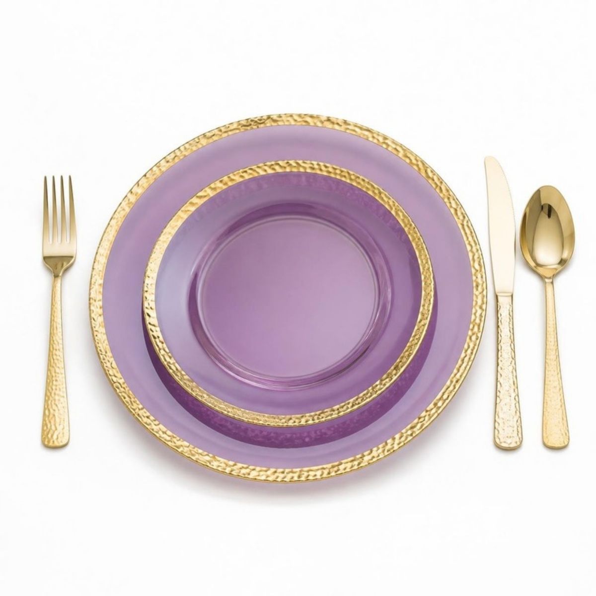 Clear purple plates with gold hammered rims and gold cutlery