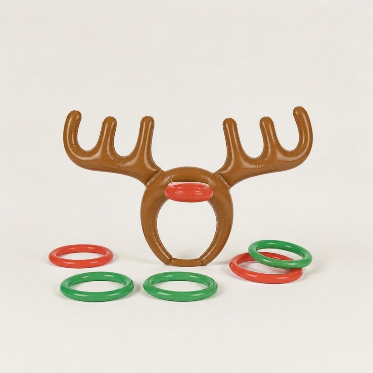 Inflatable reindeer antler headband with red and green toss rings