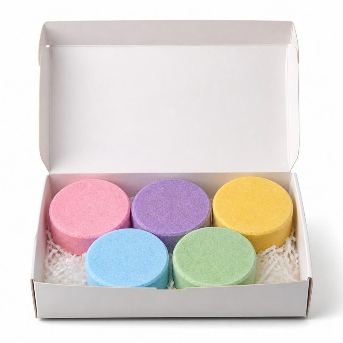 Colorful round shower steamers in a gift box