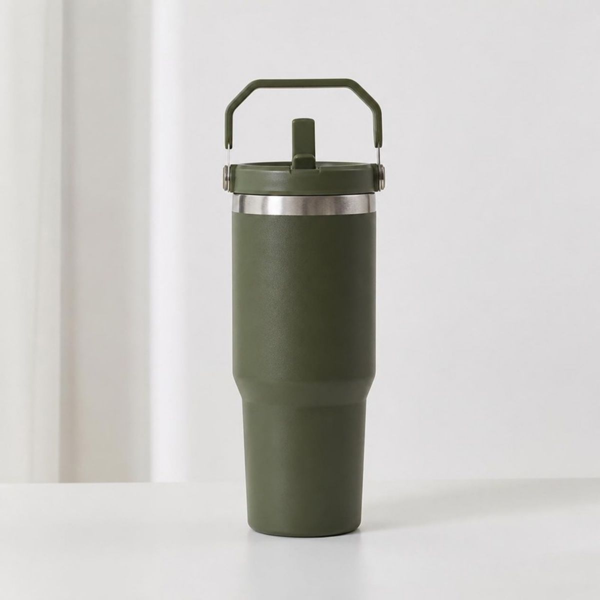 Olive green 30 oz tumbler with a carry handle and flip straw