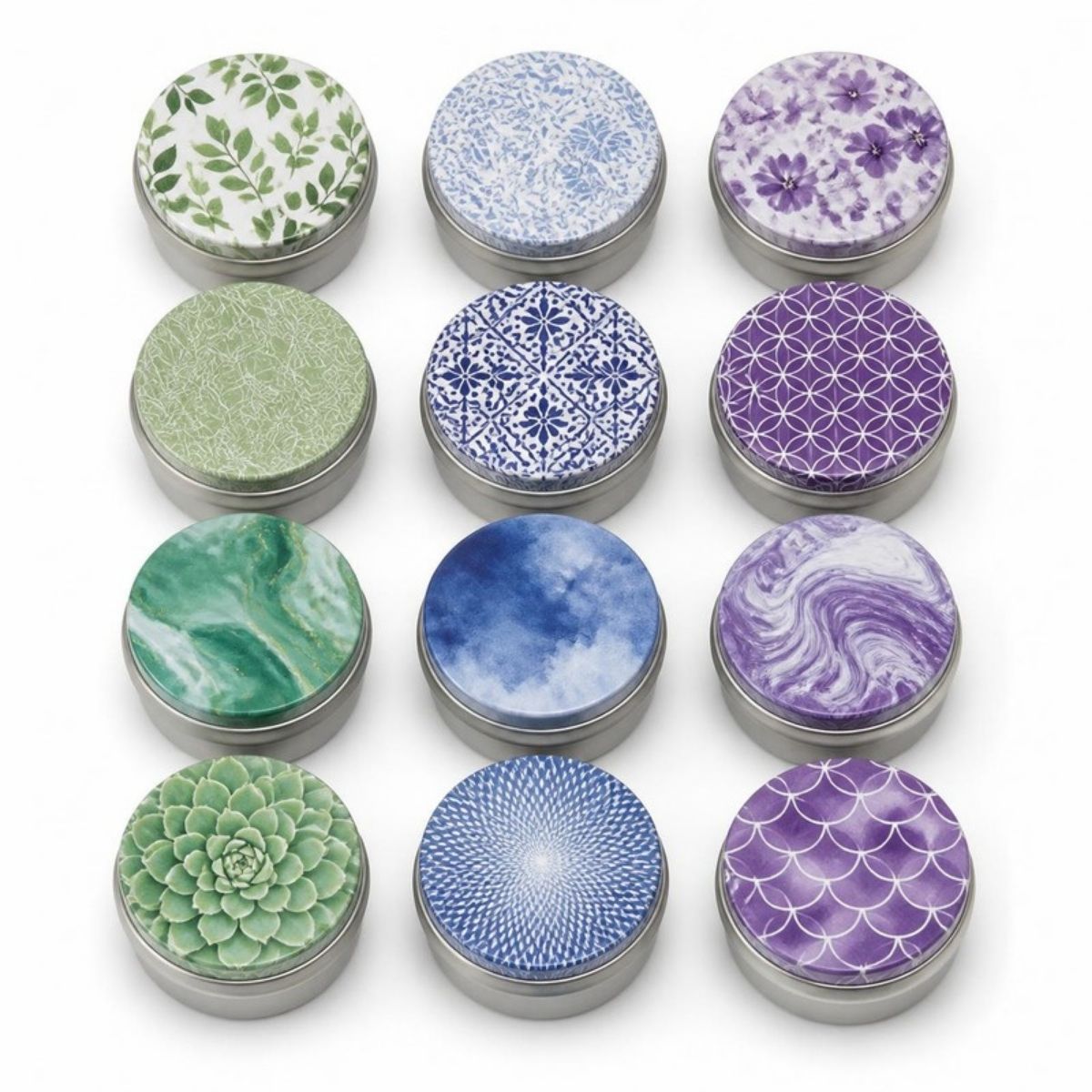 Twelve small patterned candle tins in green, blue and purple