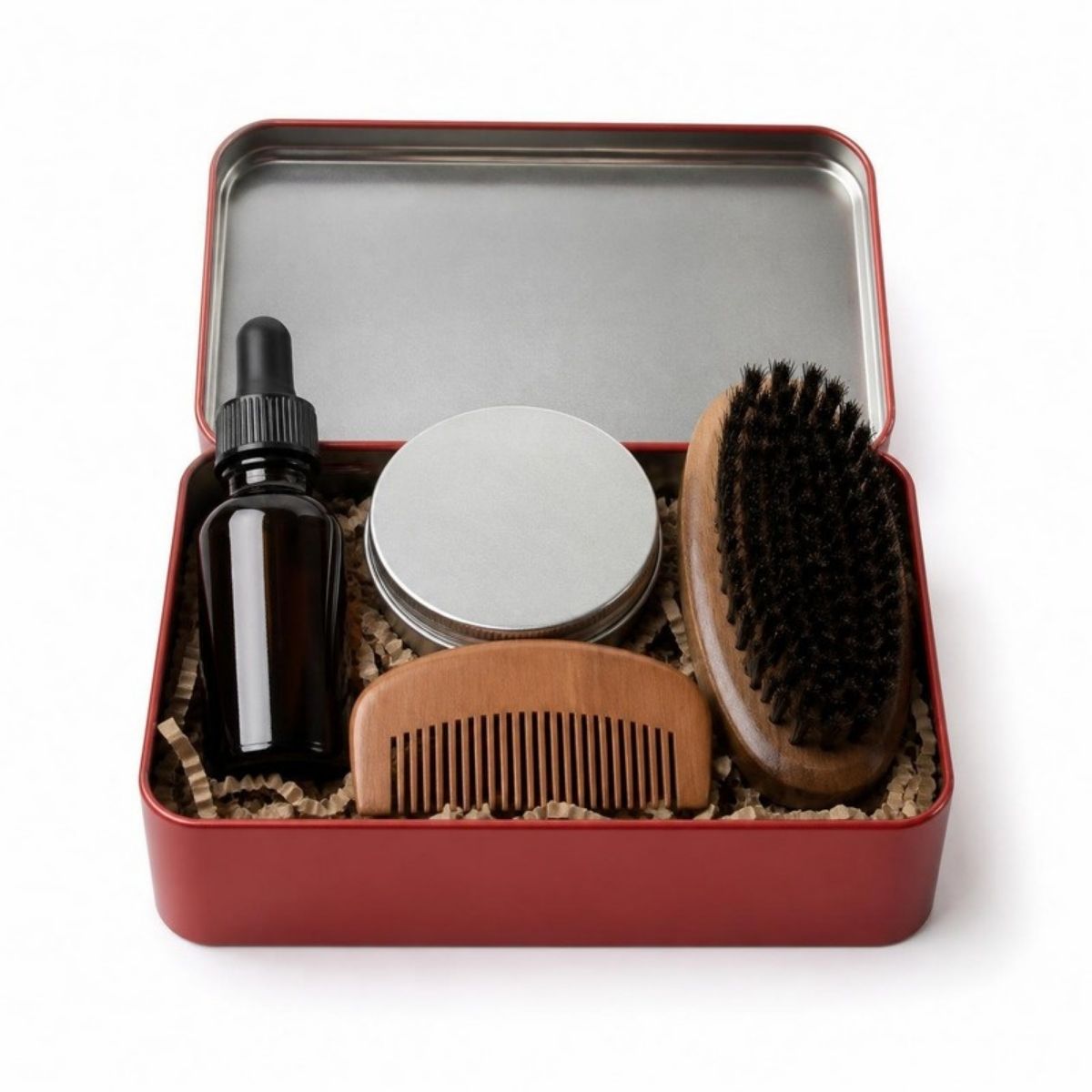 Beard oil, balm, comb and brush in a red tin box