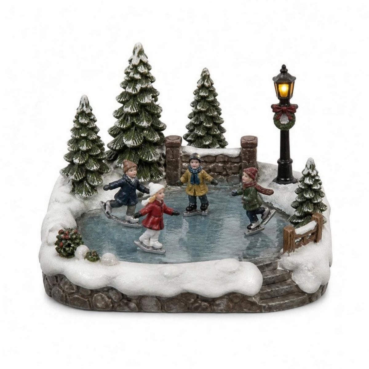 Village scene with tiny skaters on a frozen pond with trees and a lamp